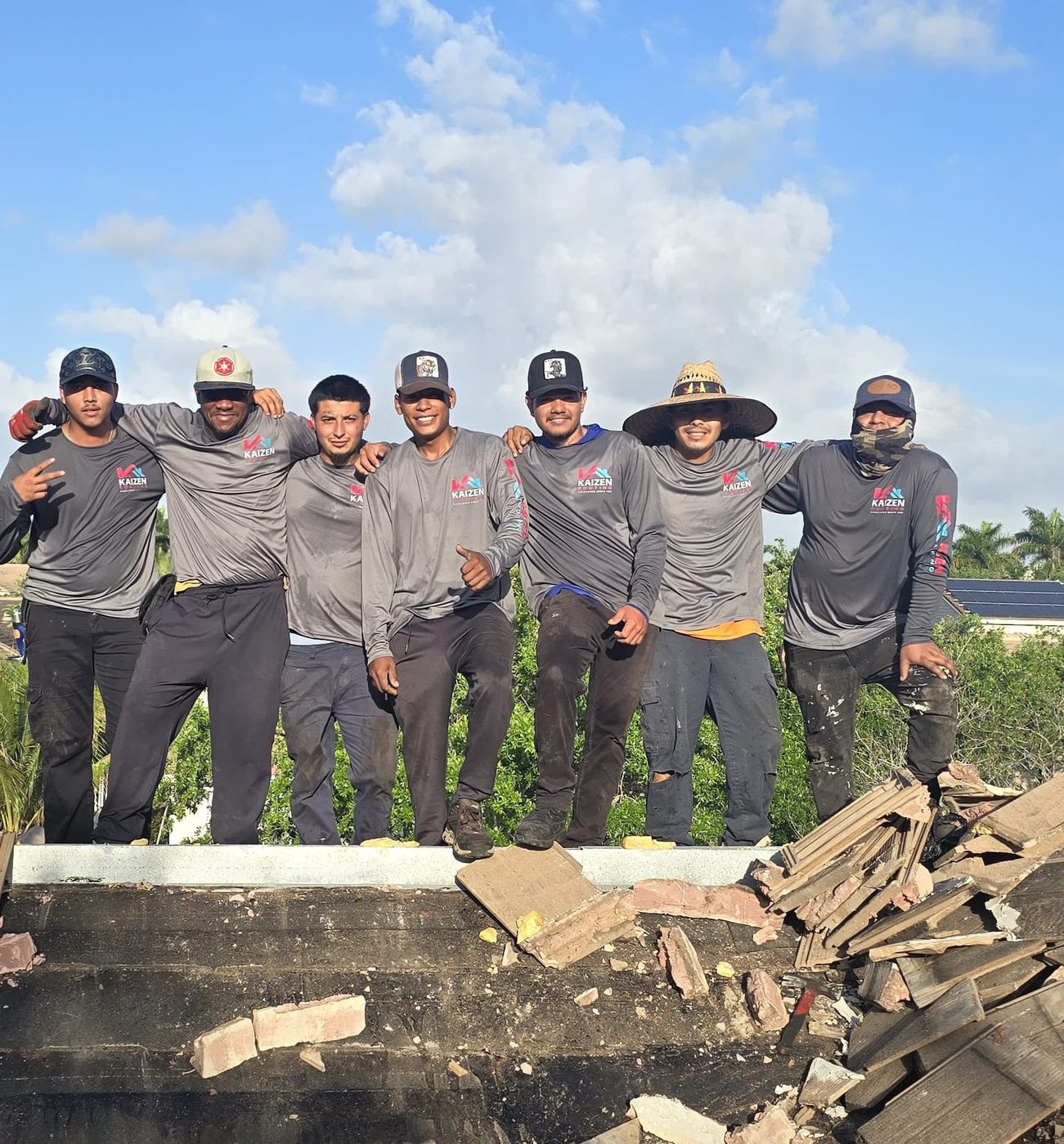 Kaizen Roofing crew on a tile roof tear-off